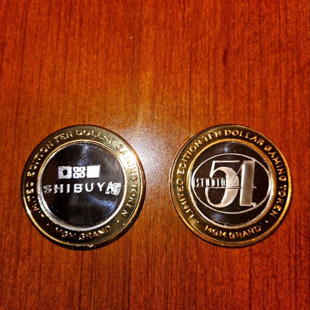 2 MGM Grand point 99 silver $10 gaming tokens.